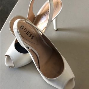 White women’s Guess  high heels shoes